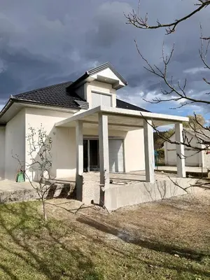 a white house with at Peace Holiday Home in Bihać