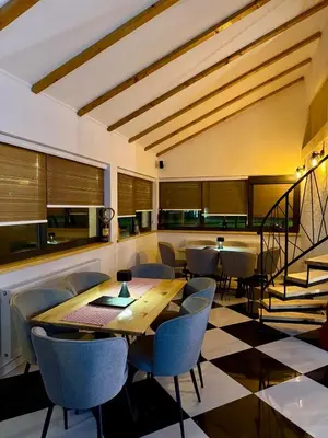 a dining room with a table and chairs at Motel Anić in Novi Travnik