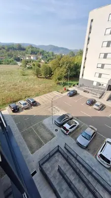 a group of cars parked in a parking lot at Stan Banjaluka Ada 1 in Rebrovac