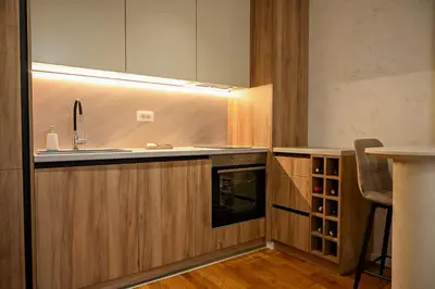 a kitchen with a sink and a counter top at Apartman Galerija 1 in Banja Luka