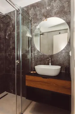 a bathroom with a sink and a mirror at Hotel Marina Home in Prijedor