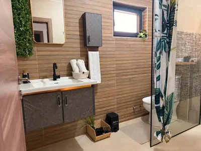 a bathroom with a sink and a toilet at Vikendica-Villa Belvedere Srebrenik in Srebrenik