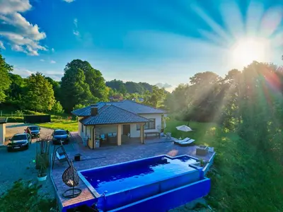 a house with a swimming pool in a yard at Vikendica-Villa Belvedere Srebrenik in Srebrenik