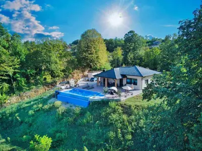 an aerial view of a house with a swimming pool at Vikendica-Villa Belvedere Srebrenik in Srebrenik