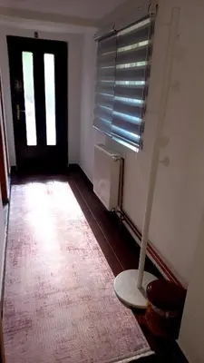an empty room with a radiator and a window at Apartman Emina in Visoko