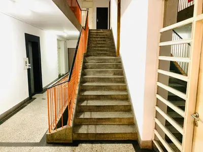 a stairway leading up to a building at Apartman H&A in Tuzla