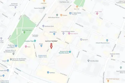 a map with a red marker on it at Apartman iza Boske in Banja Luka