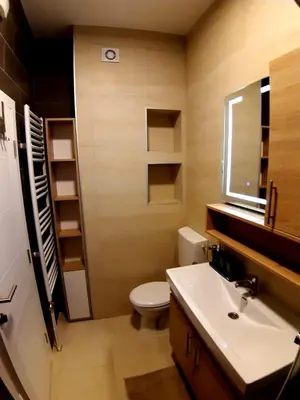 a bathroom with a toilet and a sink at Apartment Jelena in Banja Luka