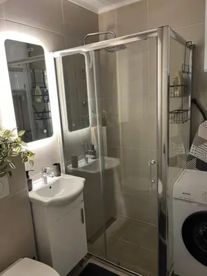 a bathroom with a shower and a sink at Apartman Alan in Travnik