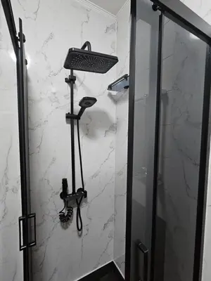 a shower in a bathroom with a shower at Toskana Tuzla in Tuzla