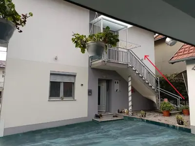a house with a balcony and a swimming pool at Jasmir in Bihać