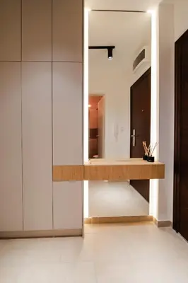 a bathroom with a sink and a mirror at Studio Compact in Doboj