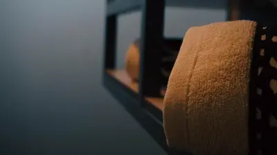 a roll of toilet paper in front of a mirror at IB Oil doo Restoran s prenoćištem in Cazin