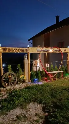 a house with a christmas decoration in front of it at Kuća za odmor Kupreška Čarolija in Kupres