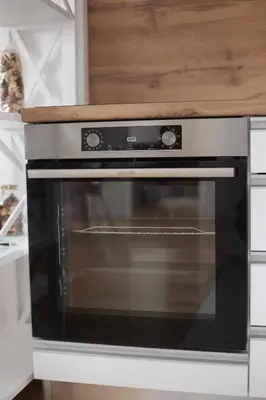 a microwave oven sitting inside of a kitchen at City Central Apartment - Top location in Banja Luka