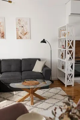 a living room with a couch and a table at City Central Apartment - Top location in Banja Luka