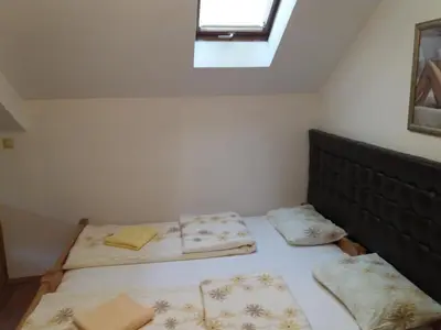 a bedroom with two beds in a room at Guest House Majstorovic in Banja Luka