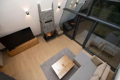 an overhead view of a living room with a flat screen tv at Vila Hill Rest in Visoko