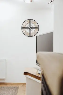 a clock on the wall in a room at Ice Queen Vlasic in Šišava