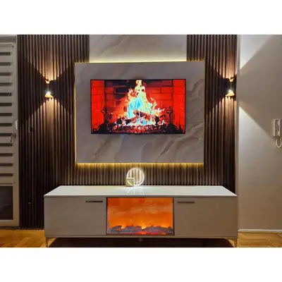 a tv in a living room with a fireplace at Apartman Greenville Banja Luka in Banja Luka