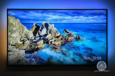 a picture of the ocean with rocks in the water at Lux Apartment 1 - Zenica in Zenica