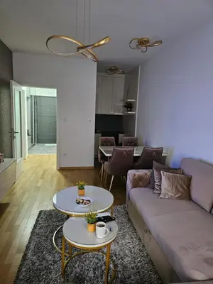 a living room with a couch and a table at Alex LUX Banjaluka in Železnička Stanica Incel