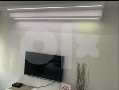 a computer monitor sitting on top of a wall at Apartman 078 in Banja Luka