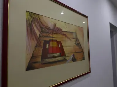 a picture of a painting of a lamp on a wall at Apartmani Sweet Dreams in Banja Luka
