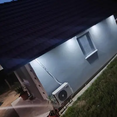 a house with a speaker on the side of it at Vikendica La Anja in Laktaši
