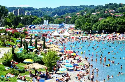 a large crowd of people at a beach at Apartman Duric in Tuzla
