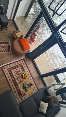 an overhead view of a living room with a couch at Lukina koliba-vikendica-Manjaca in Banja Luka