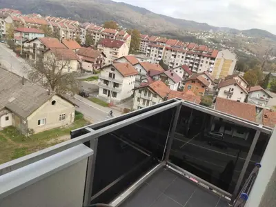 a balcony with a view of a city at Apartman Luka in Doboj