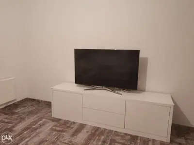 a white cabinet with a television on top of it at Centar in Banja Luka