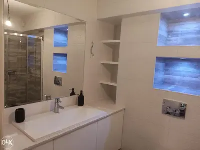 a bathroom with a sink and a mirror at Centar in Banja Luka