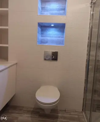 a bathroom with a toilet and a glass shower at Centar in Banja Luka