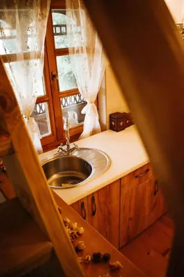 a bathroom with a sink and a window at Koliba Brezova šuma in Čović Polje