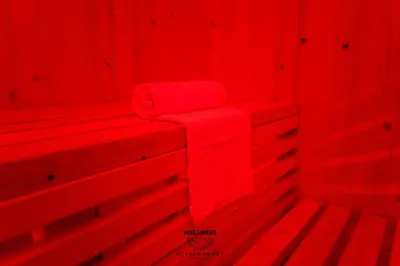 a red room with two red benches in it at Heaven Heart - Apartmani Tuzla in Tuzla