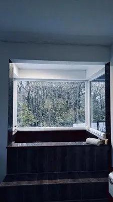 a large window in a room with a view at Vila Roda in Banja Luka