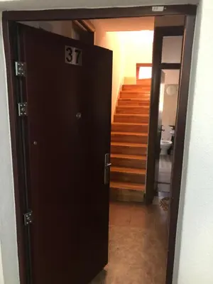 a door with the number on it in a hallway at Sindbad Vlašić in Vlasic