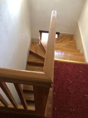 a staircase in a room with wooden floors at Sindbad Vlašić in Vlasic