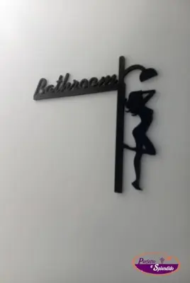 a picture of a man hanging on a sign at Perfetto e Splendido! in Banja Luka