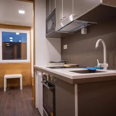 a kitchen with a sink and a counter top at Ćuranov rep in Mrkonjić Grad