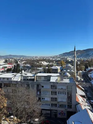 a view of a city with a mosque in the background at Apartment Banja Luka in Banja Luka