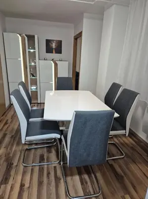 a white table and chairs in a room at Studio Apartment Borik 19 in Banja Luka