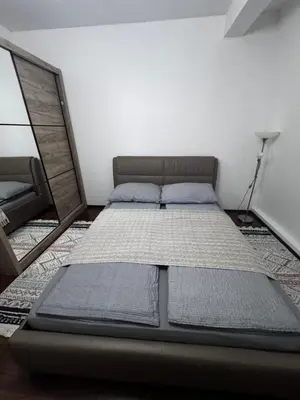 a bed in a room with a mirror at Sweet Home Vlasic in Vlasic