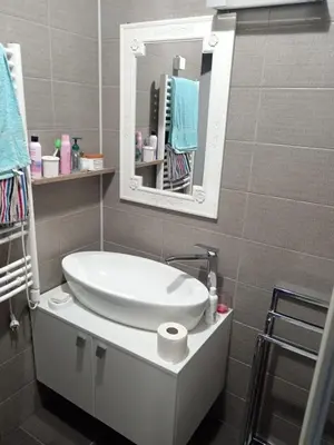 a bathroom with a sink and a mirror at Sweet Home Vlasic in Vlasic