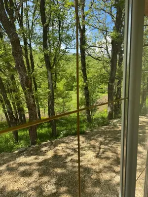a view from a window of a yard at Country House Lištani-renta quad in Livno