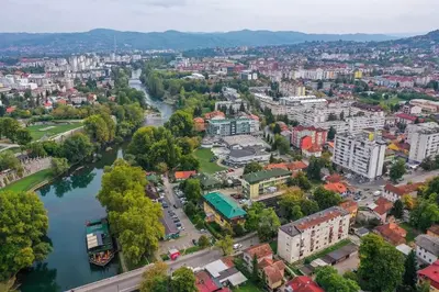 an aerial view of a city with a river at Perfect Serene Escape in Kuljani