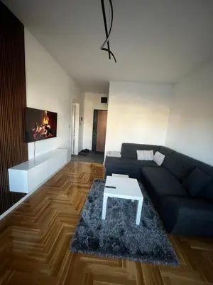 a living room with a couch and a coffee table at Apartman Sofija Banja Luka in Banja Luka