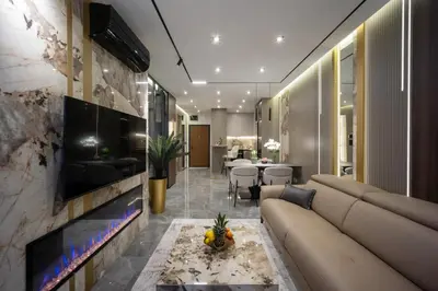 a living room with a couch and a tv at Luxury Apartments Palata - Stan Infinity in Banja Luka